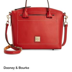 Dooney & Bourke medium domed smooth leather satchel w/bag and registration card.